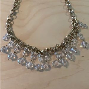 Gold necklace with clear bead dangles
